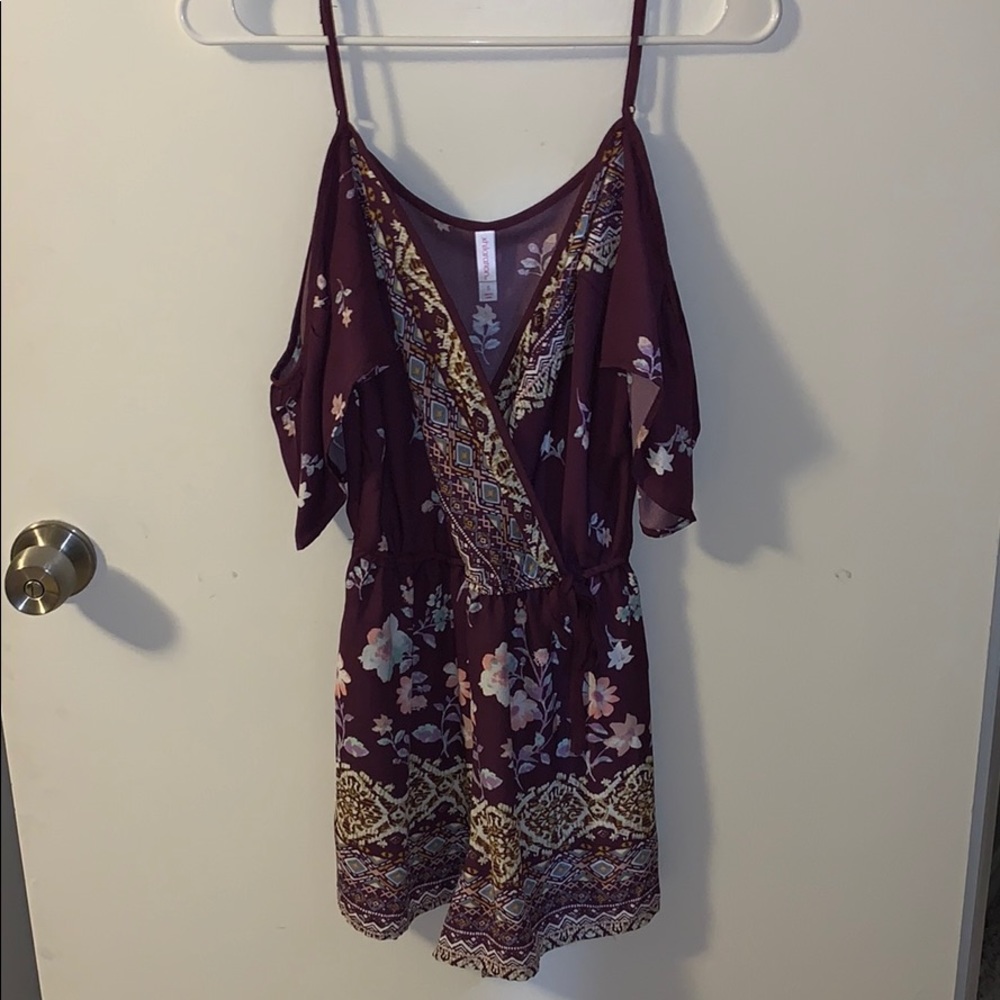 purple romper w/ floral designs (worn once)